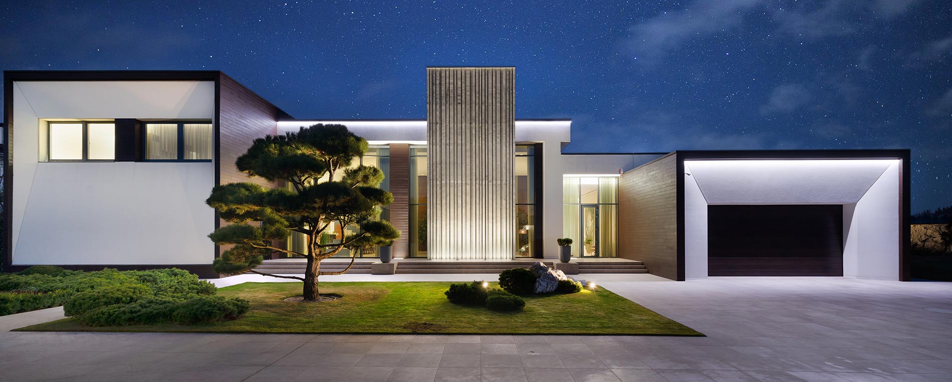 A view to a modern house with garage